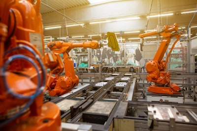 Robotic arms on an automated factory floor