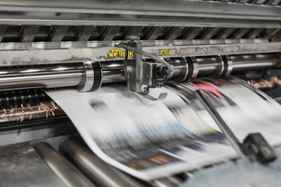 Industrial printing press running sheets