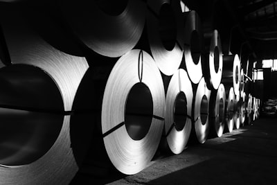 Stacked steel coils in a warehouse