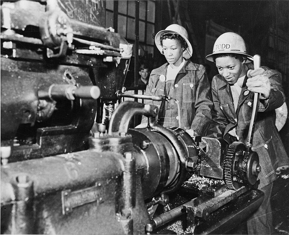 Machinist cutting bolts, 1942