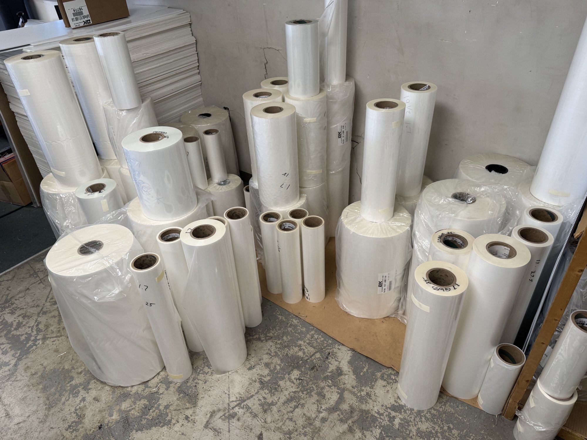 Bulk D&K SuperStick Thermal Roll Laminating Film -- ~200 Rolls -- Shop Closing — D&K SuperStick main photo